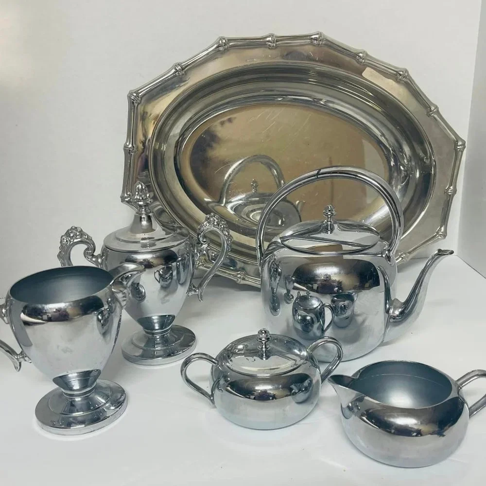 Silverplated ~stainless steel pieces. Tray, Teapot, 2 Sugar Bowls, 2 Creamers ~
